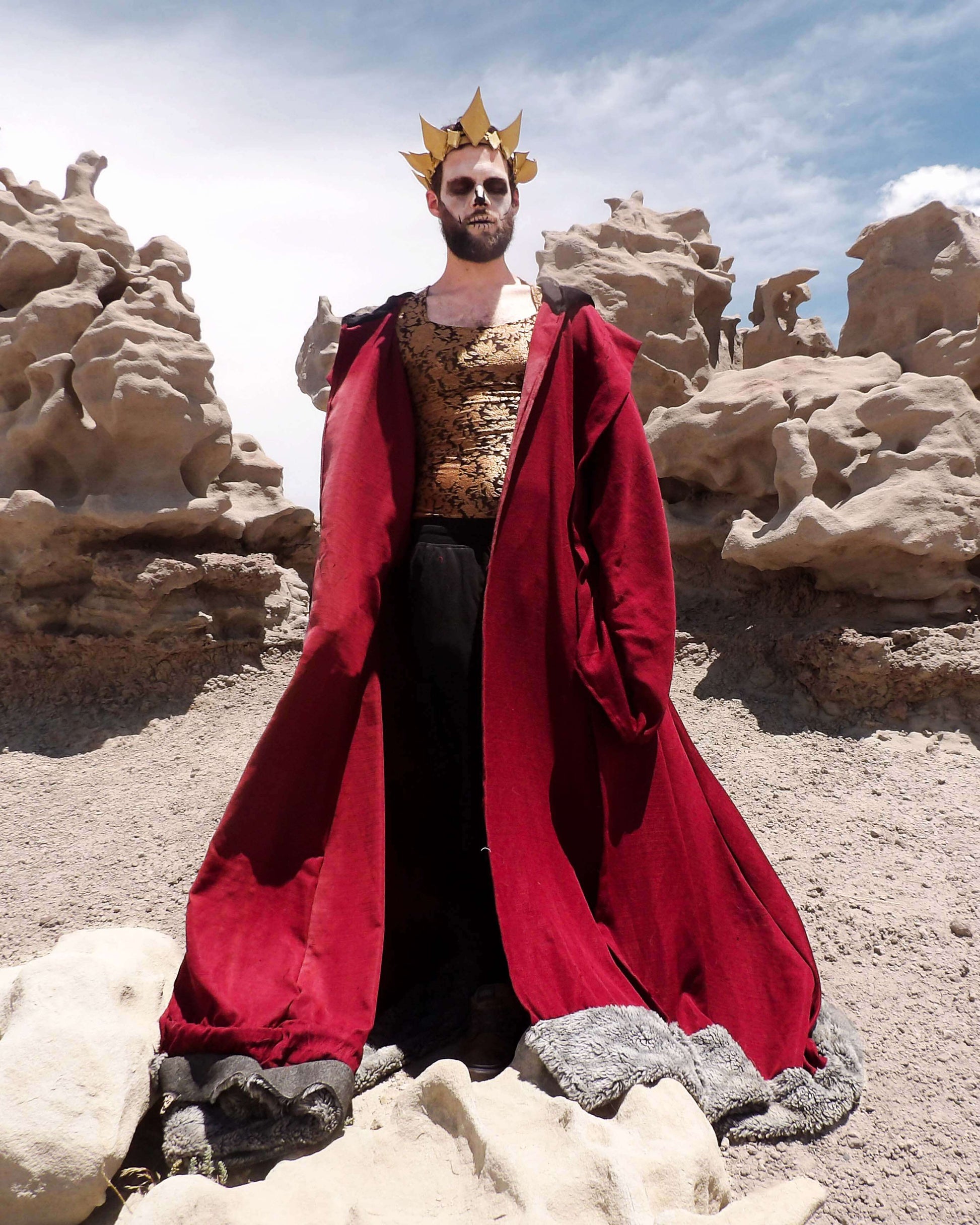 skull king in king attire in desert
