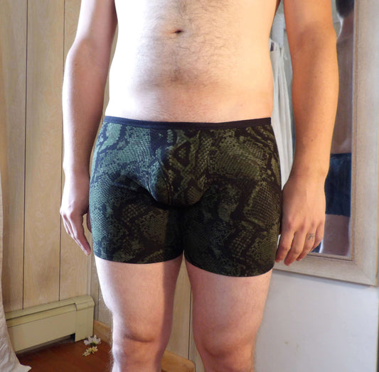 male model in snake print boxer briefs