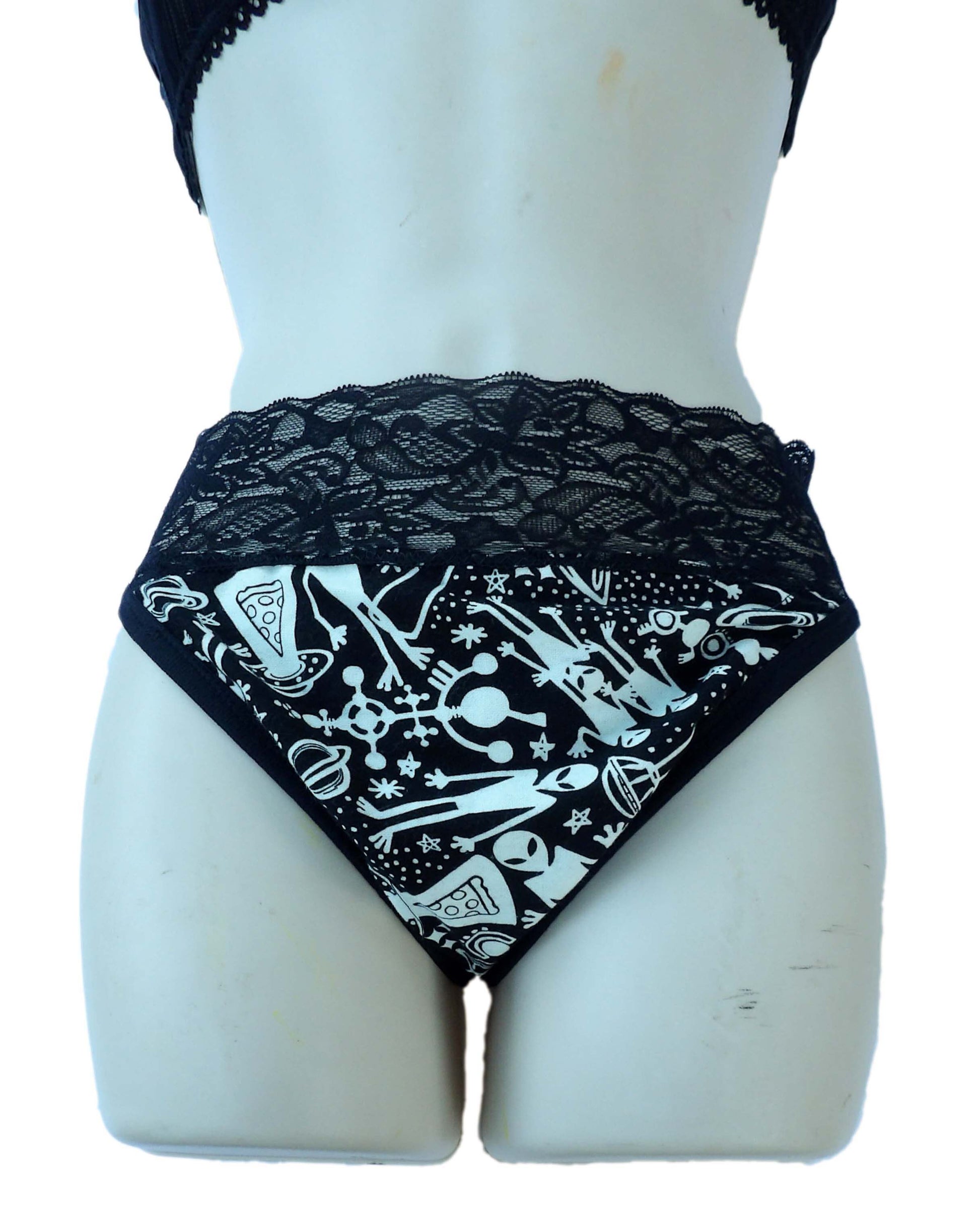 alien, ufo, and pizza undies on a mannequin