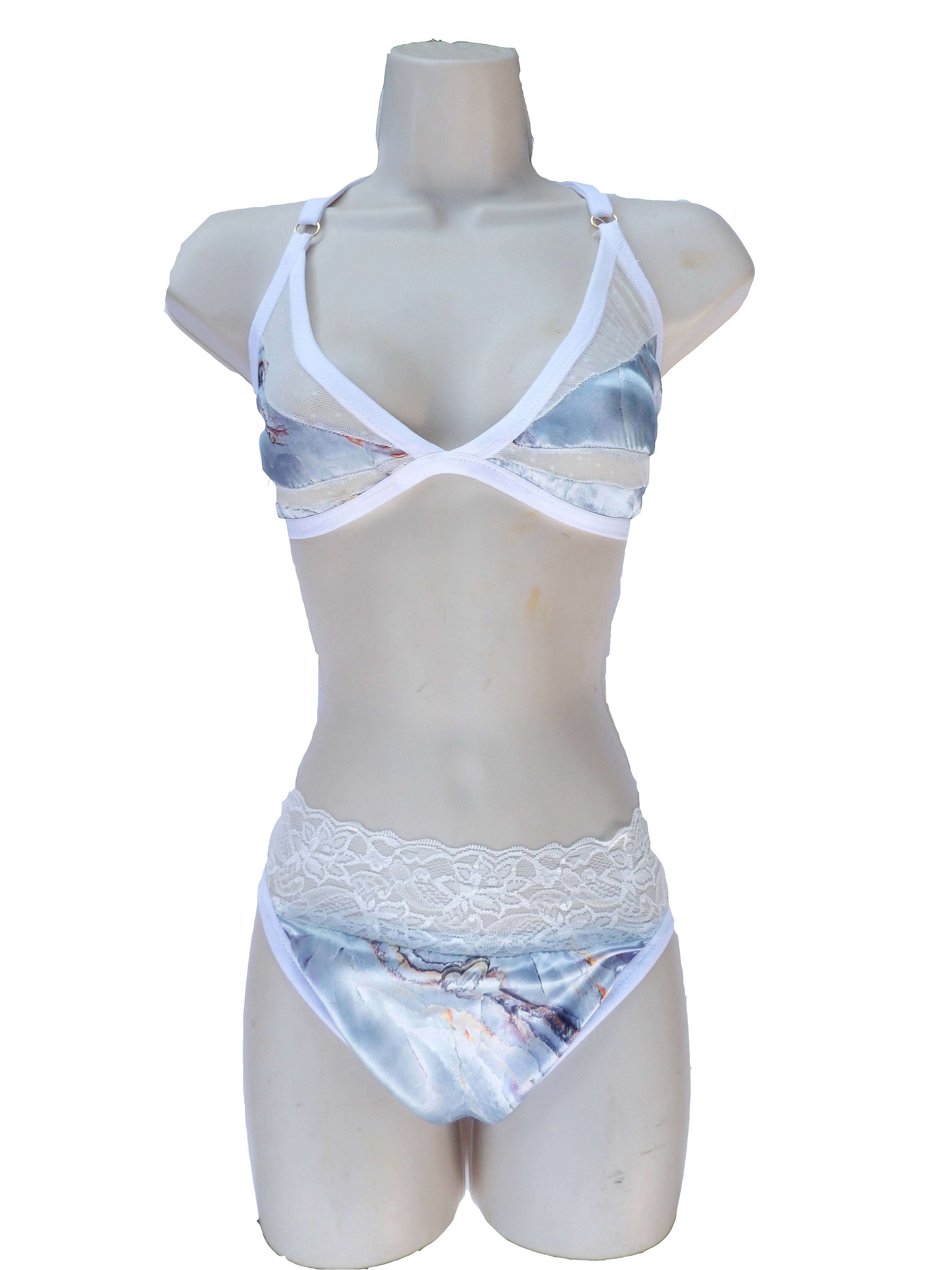 shiny satin lingerie on mannequin