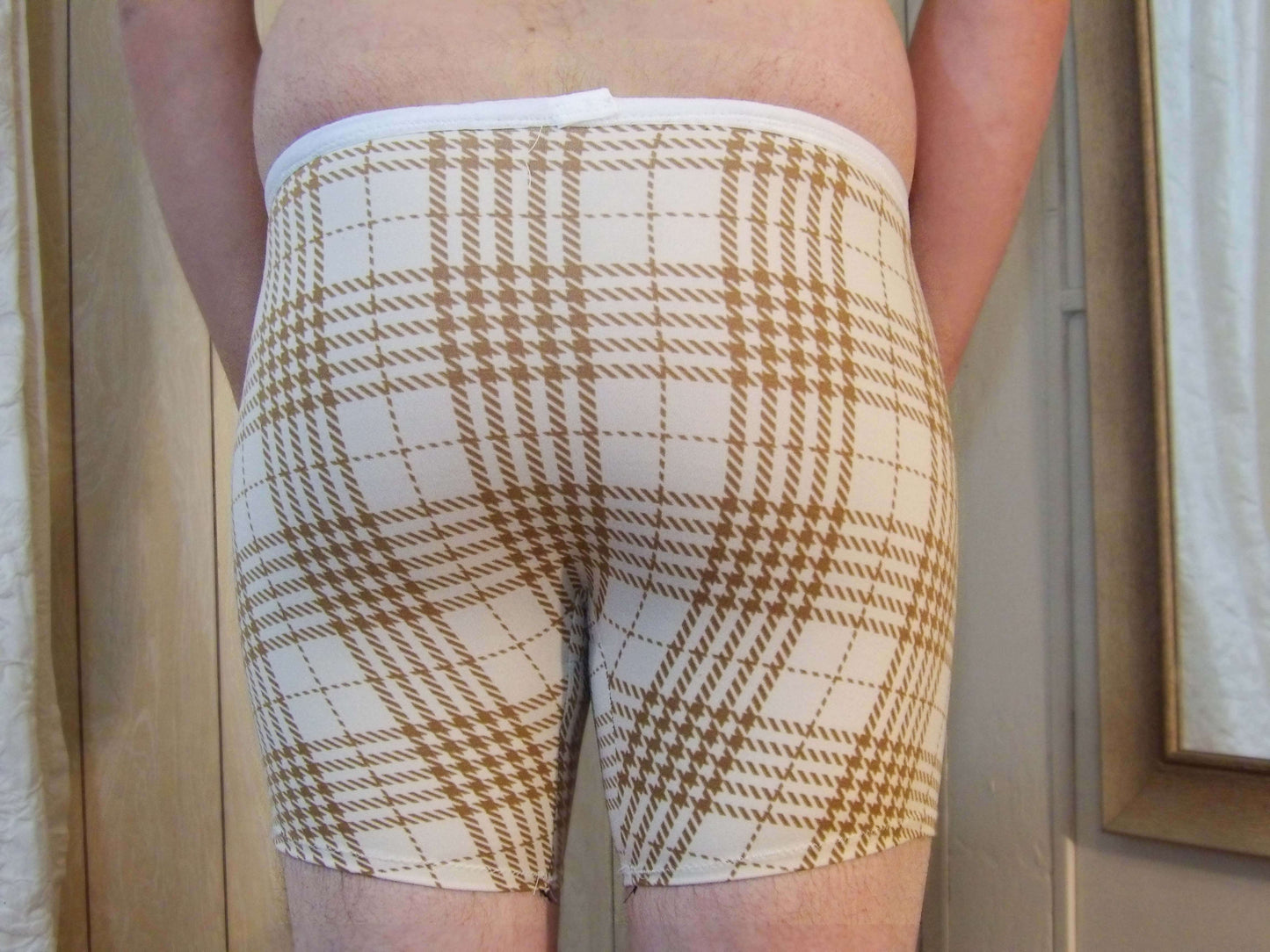 back model in tartan boxer briefs