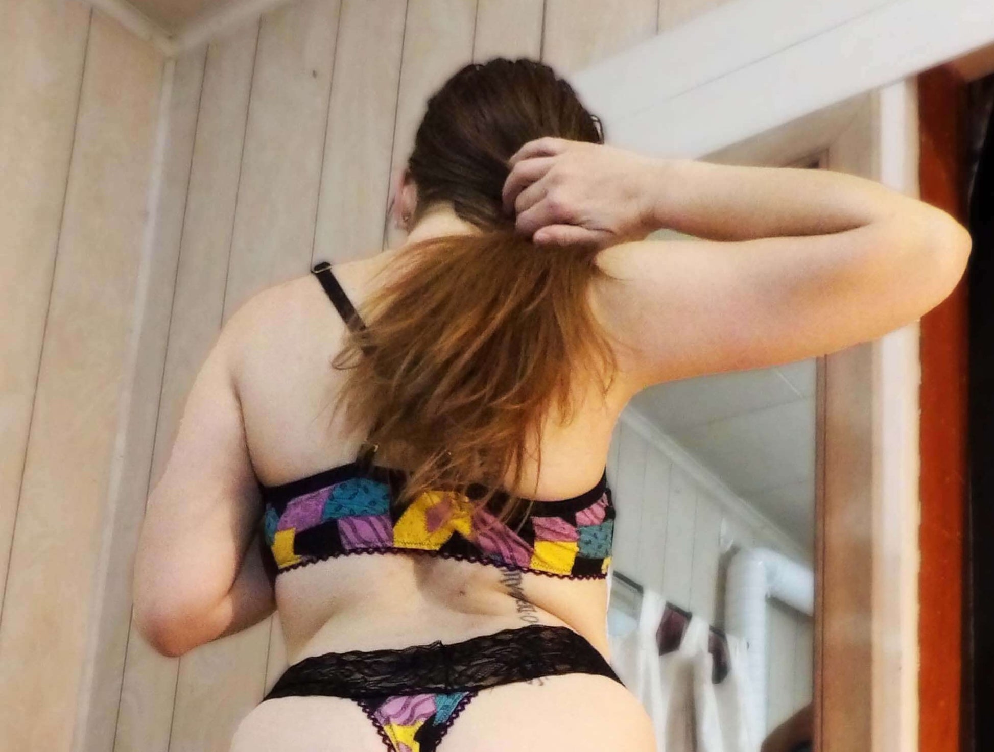 back of model in unique lingerie