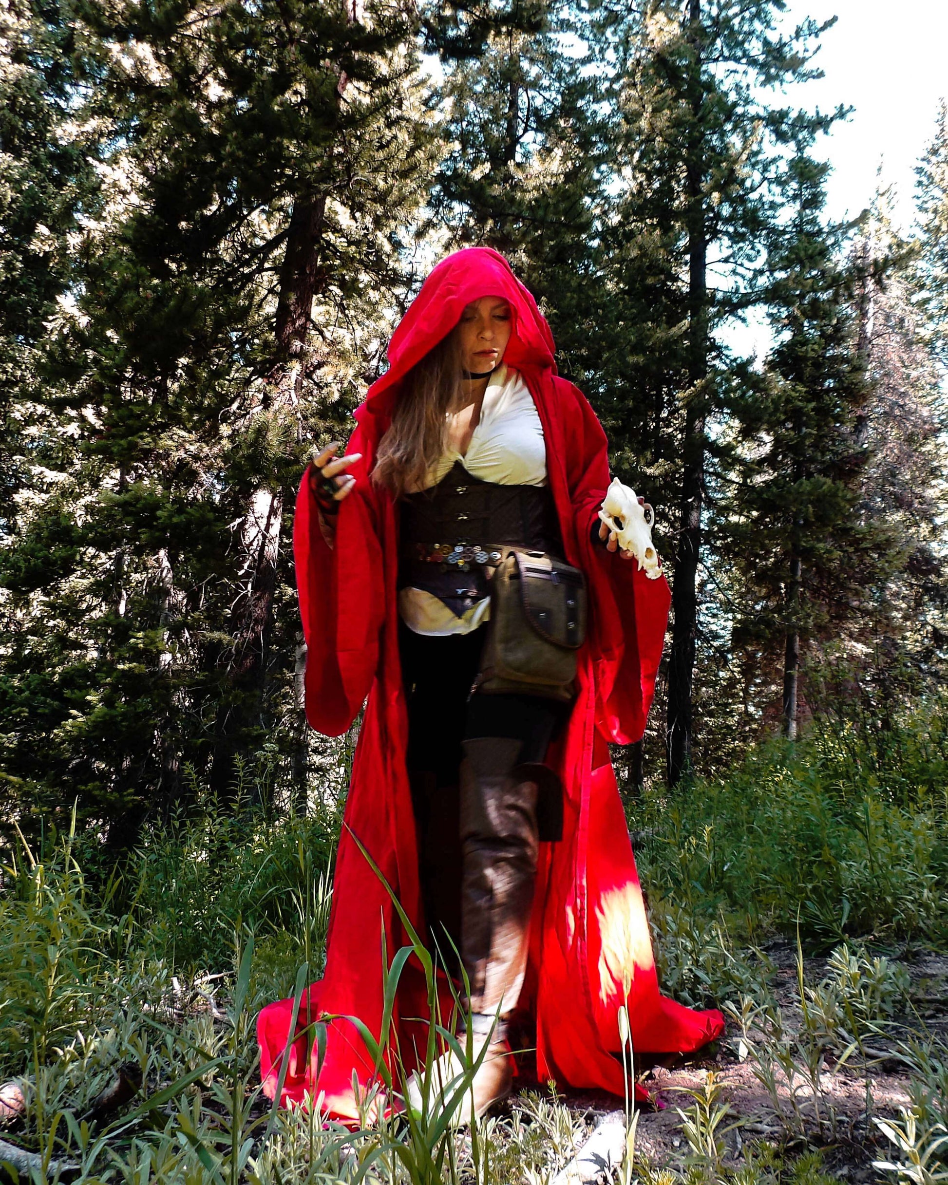 model in red robe costume