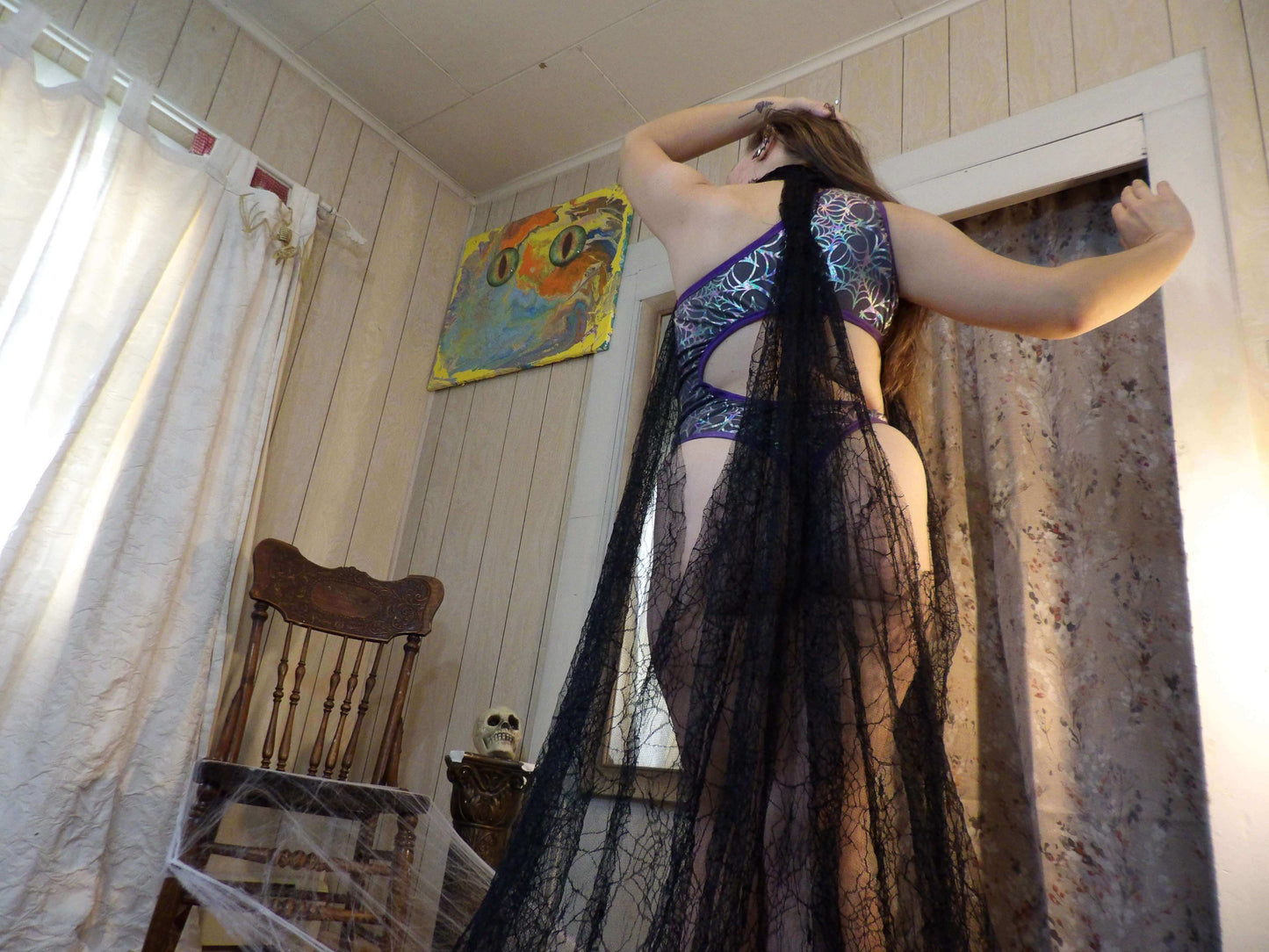 Peek Through the Webs Sleeveless, Pleated Robe with Neck Closure