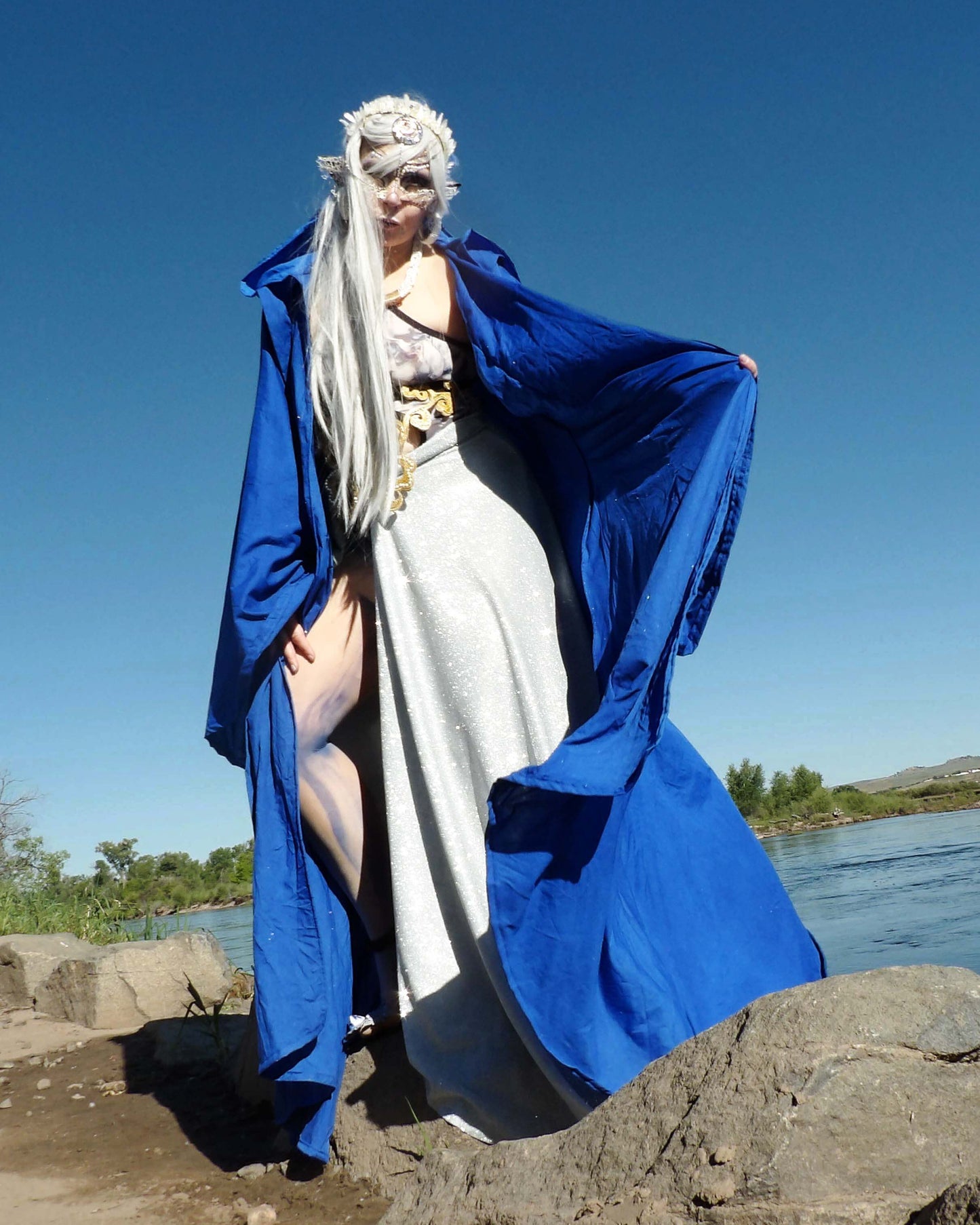 water elf holding blue robe