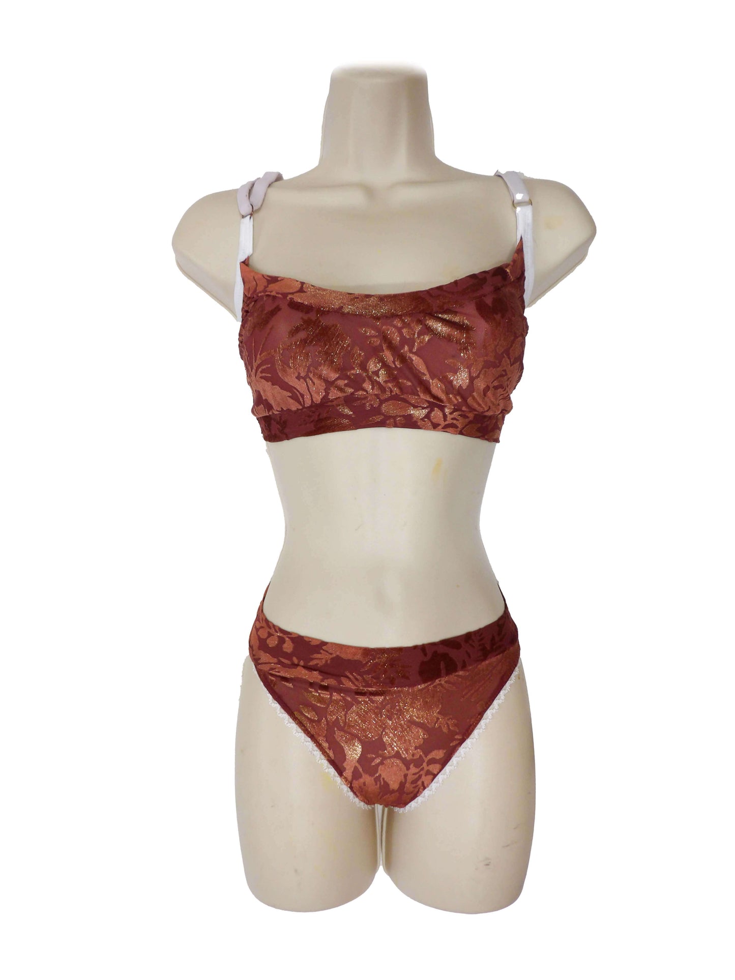 burgundy ang gold lingerie on mannequin