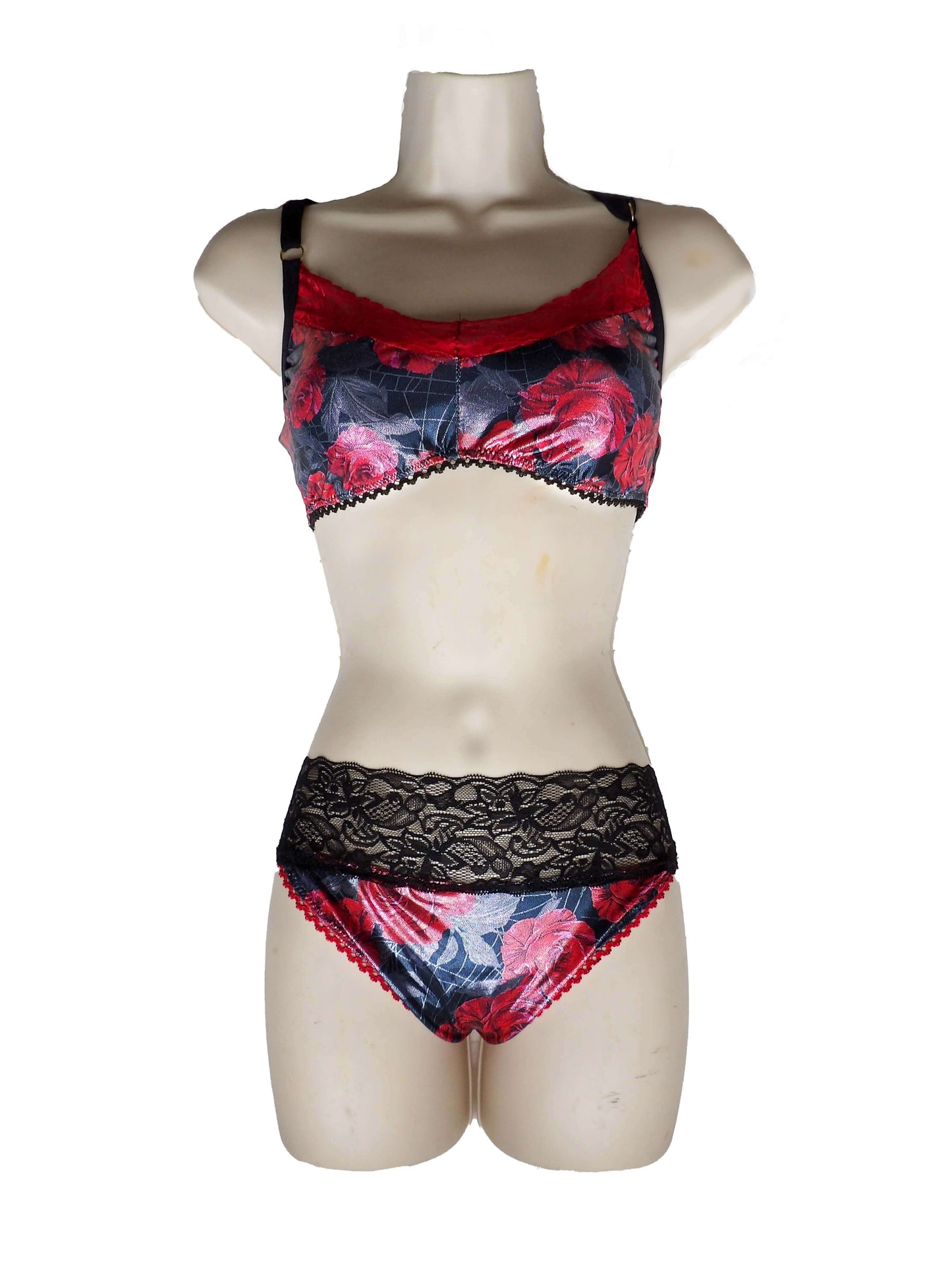 shiny rose print lingerie on mannequin