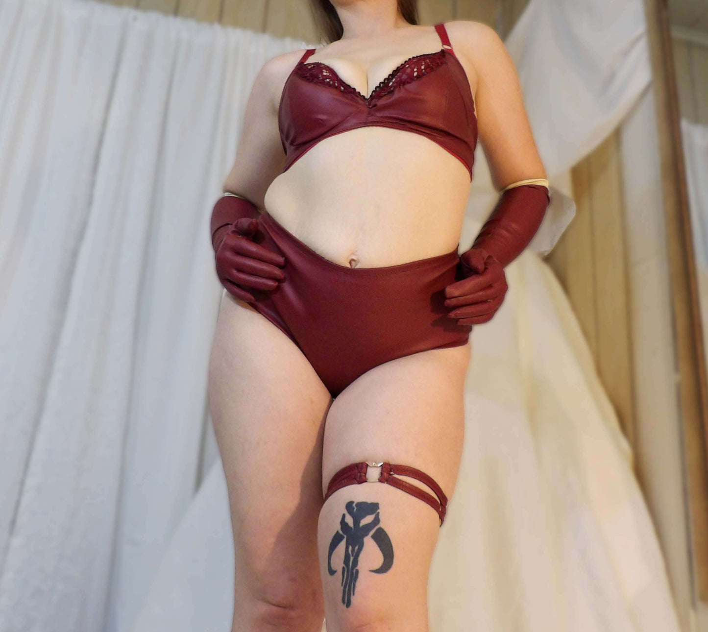 curvy woman in burgundy lingerie