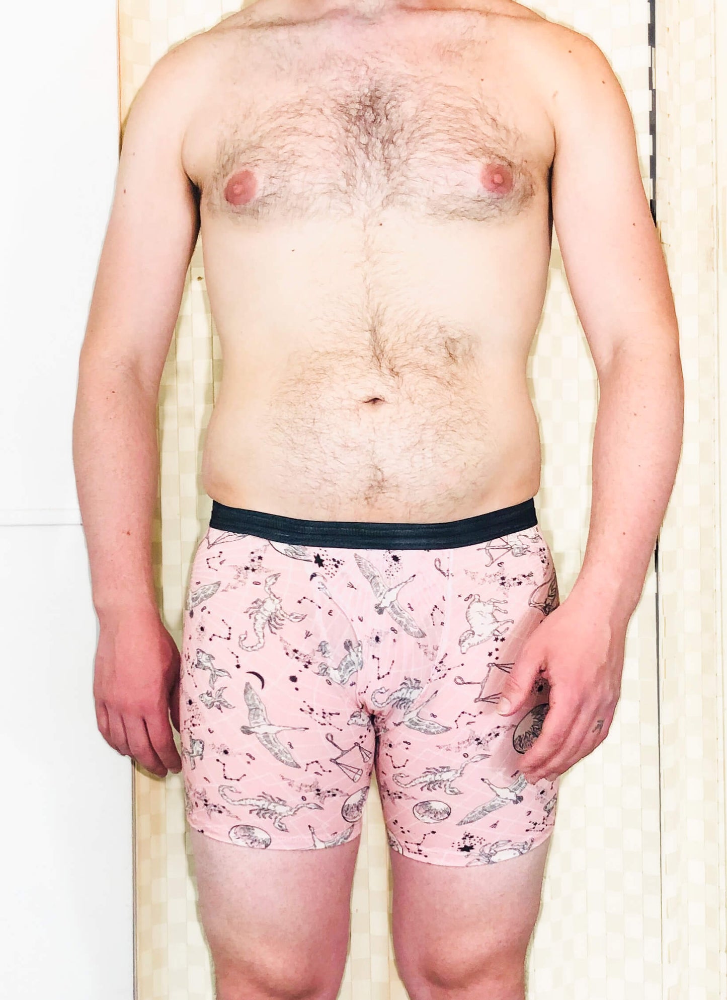 model wearing light pink boxer briefs