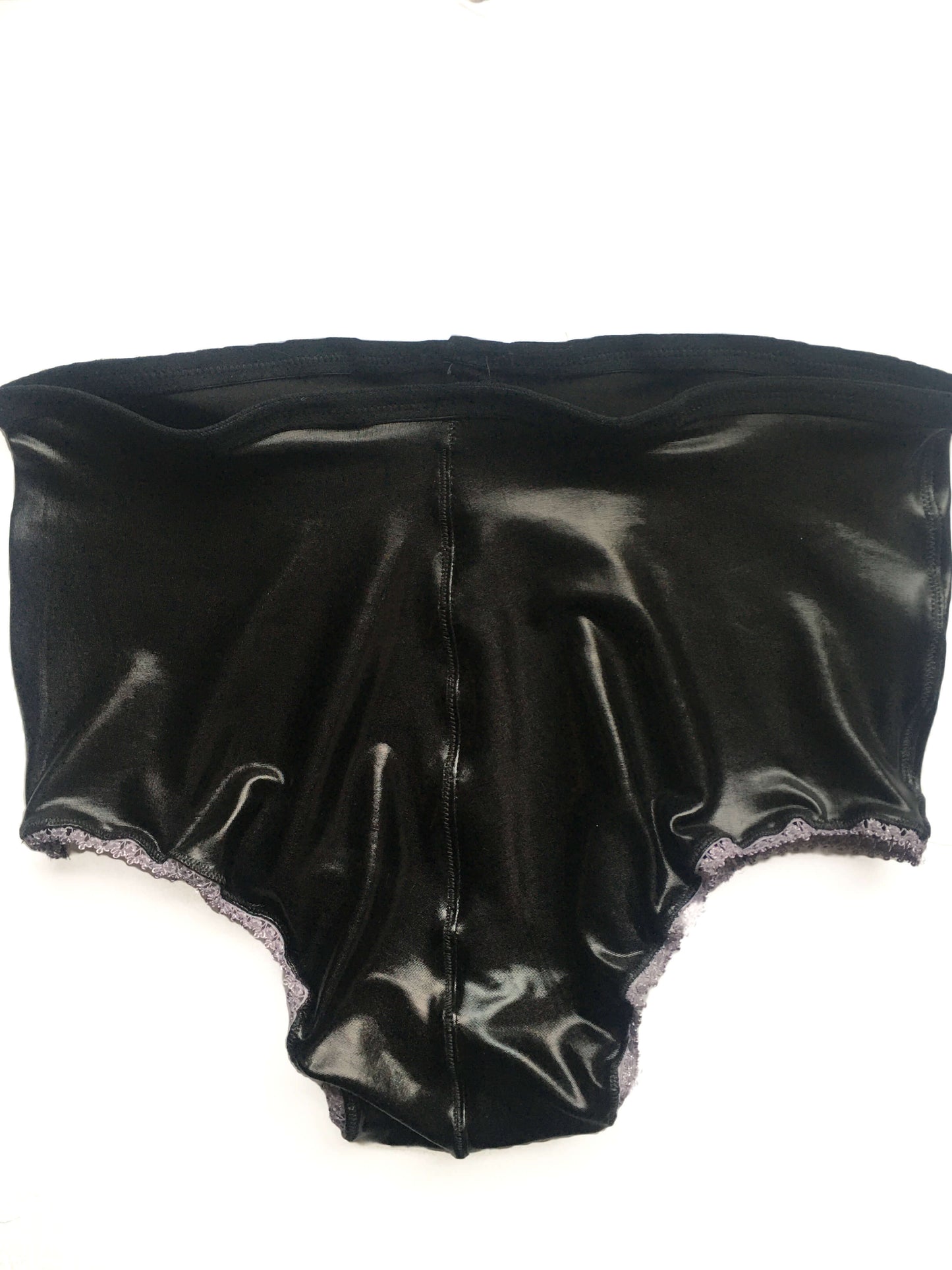 Sleek black high waist and high thigh Brazilian style undies