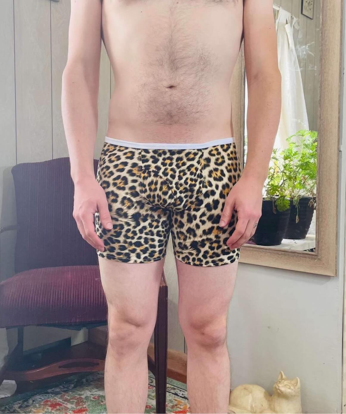 model in cheetah print boxer briefs
