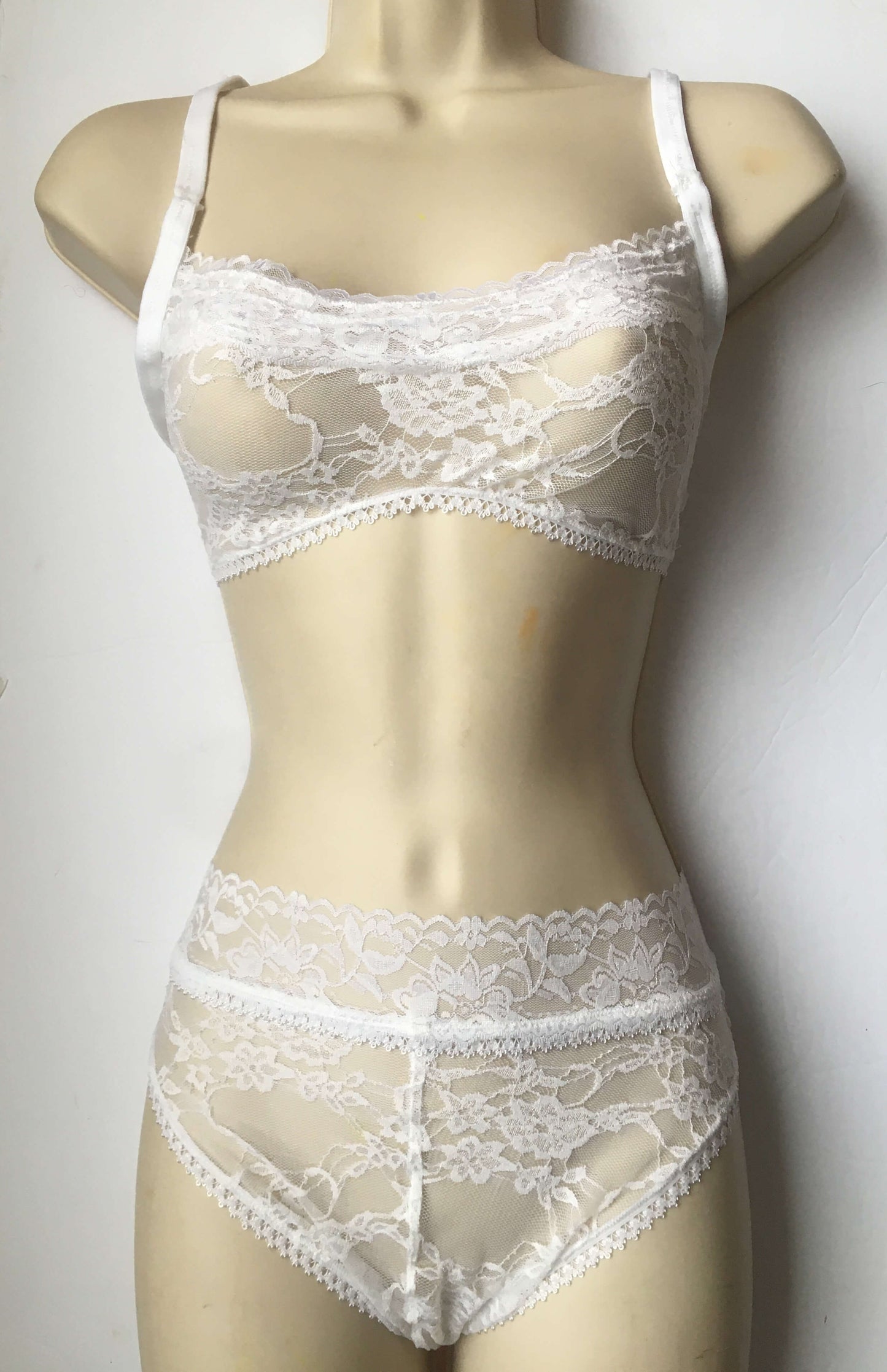 white lace lingerie on mannequin