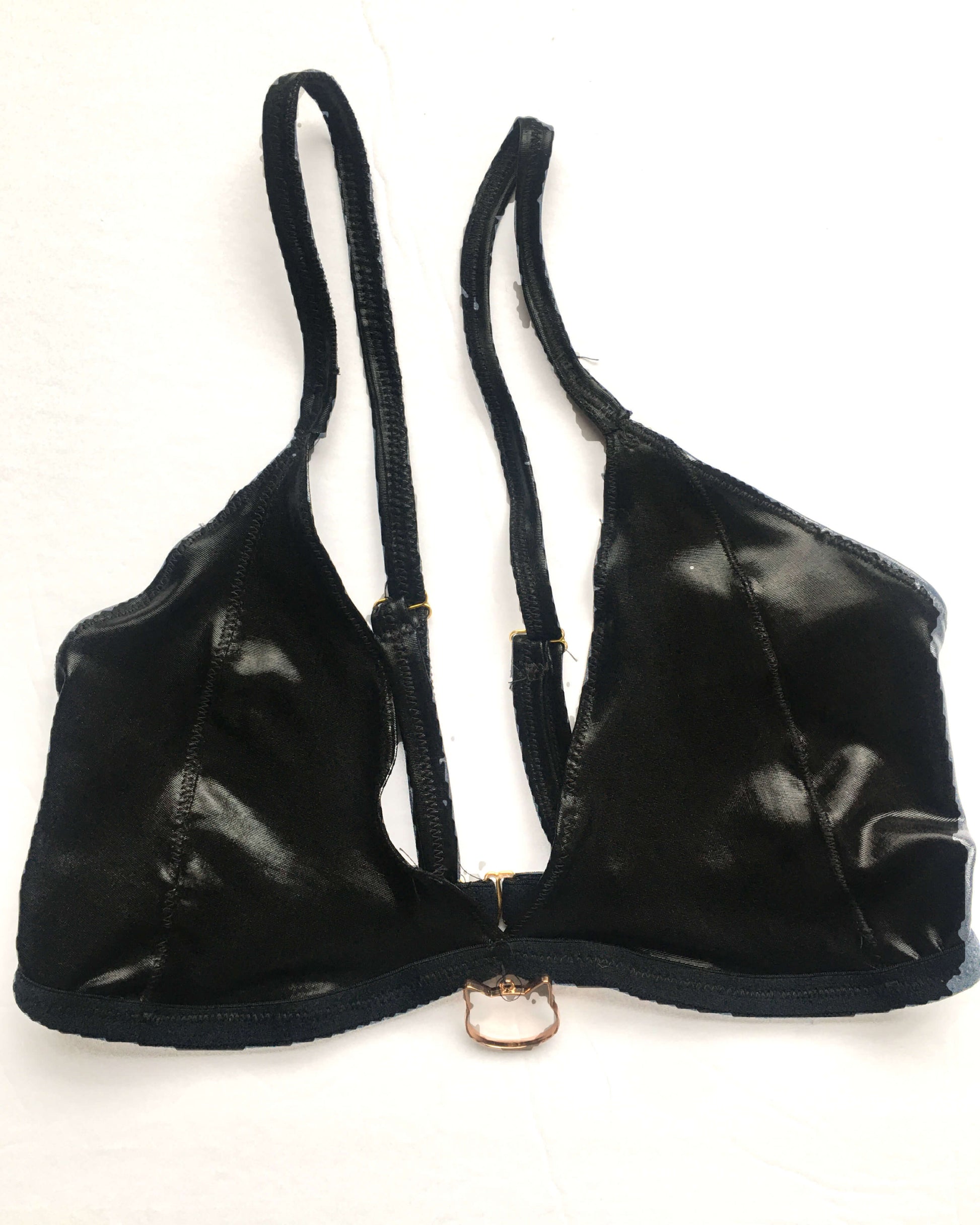 black lingerie with kitty hardware at center front