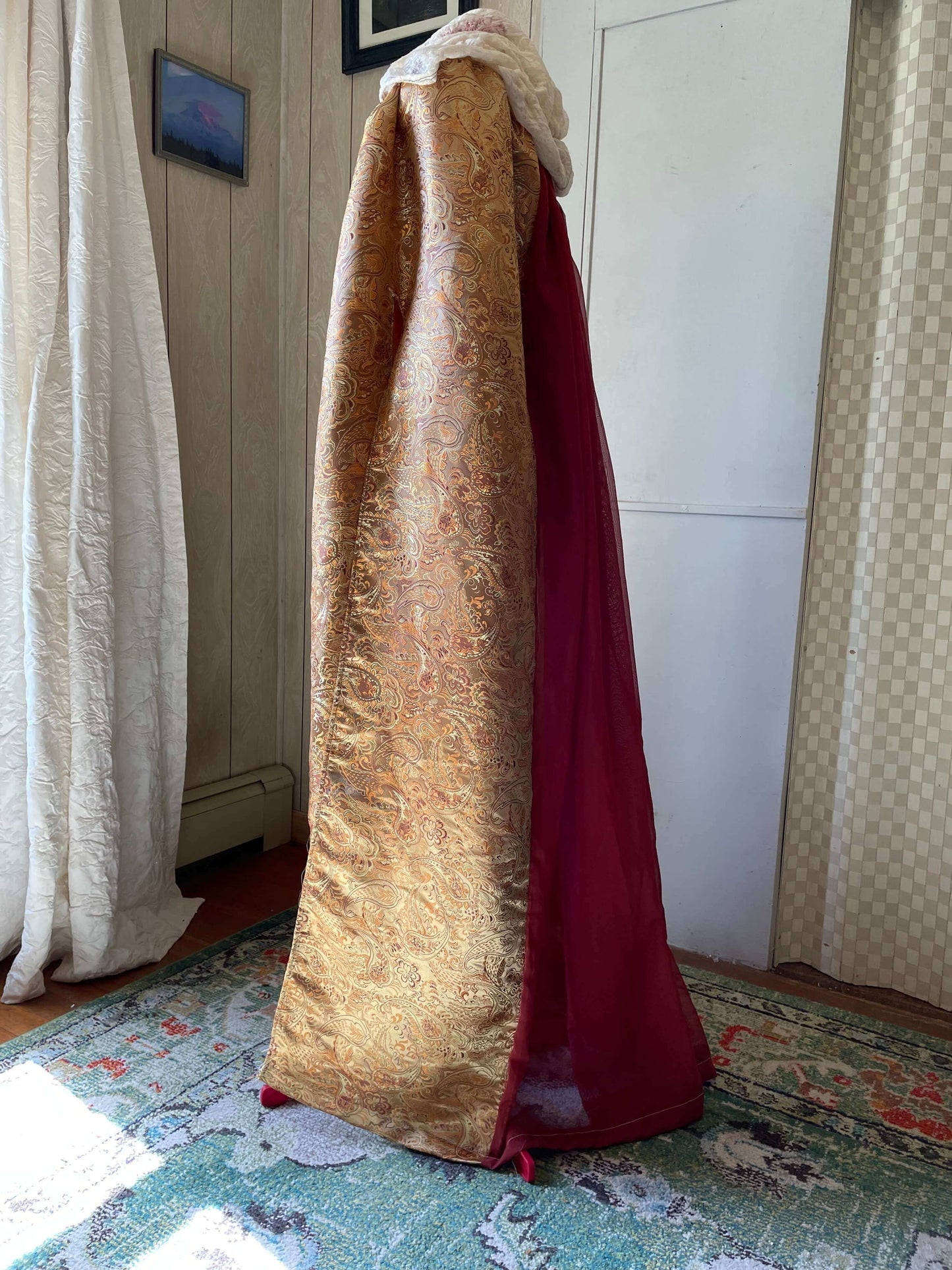 Queen’s Golden Cloak