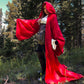 side profile of model in red costume robe